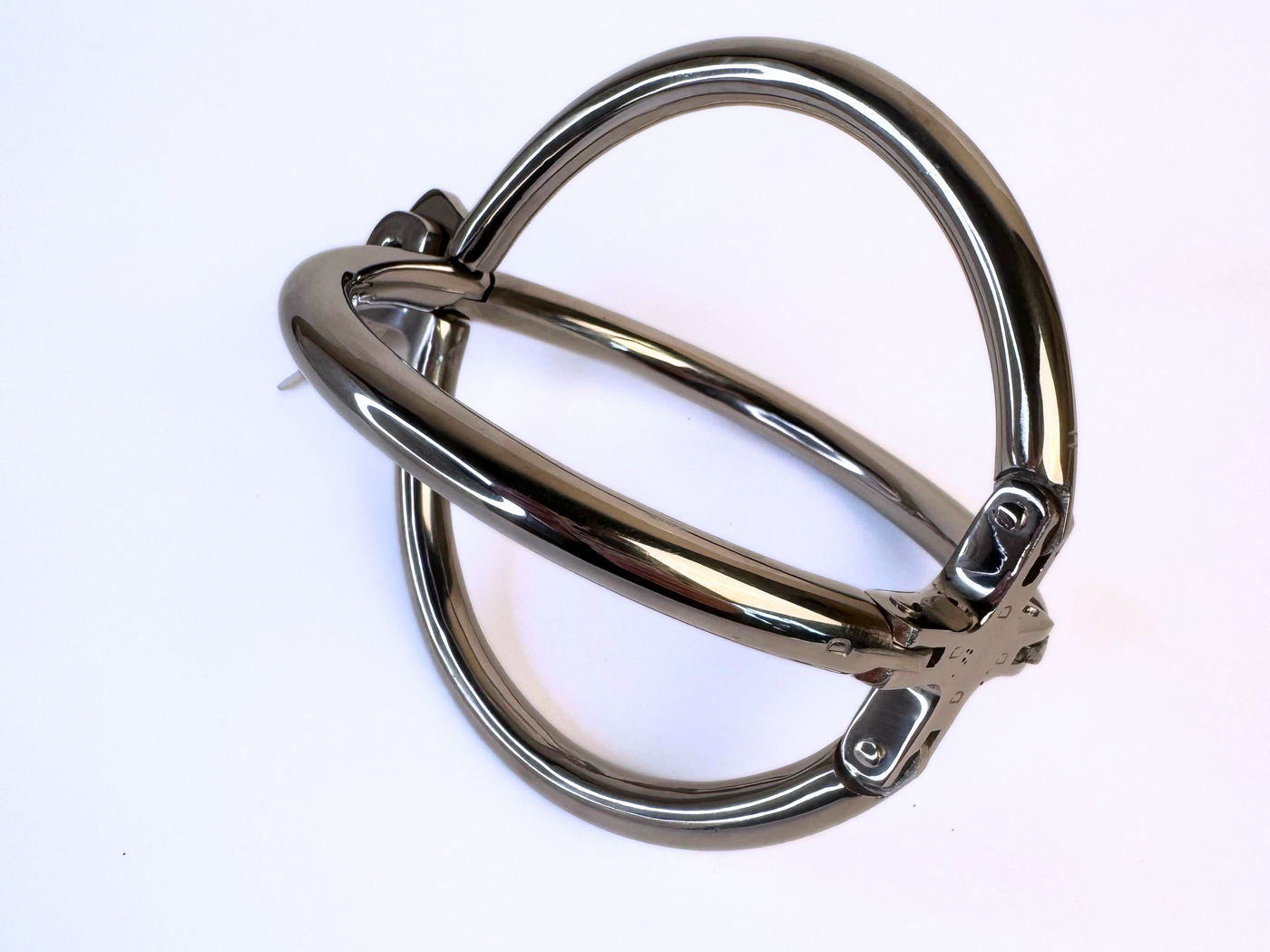 Crossed Rings | Locking Stainless Steel Cuff
