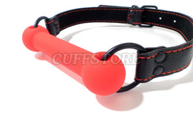 Angled view of the red silicone bit and attachment rings