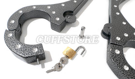 Opened restraint with padlock and two keys
