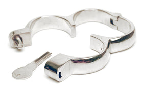 Angled view of the open Hamburg leg irons with key